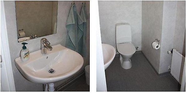 Toilettes avec cuvette, lavabo et miroir.
